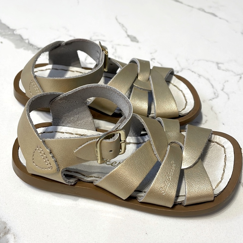 Little girl saltwater sandals. Champagne gold.